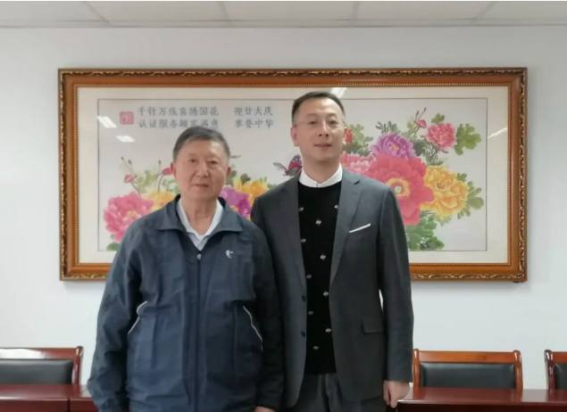 胡金發老師與體系認證總監劉建峰先生親切合影